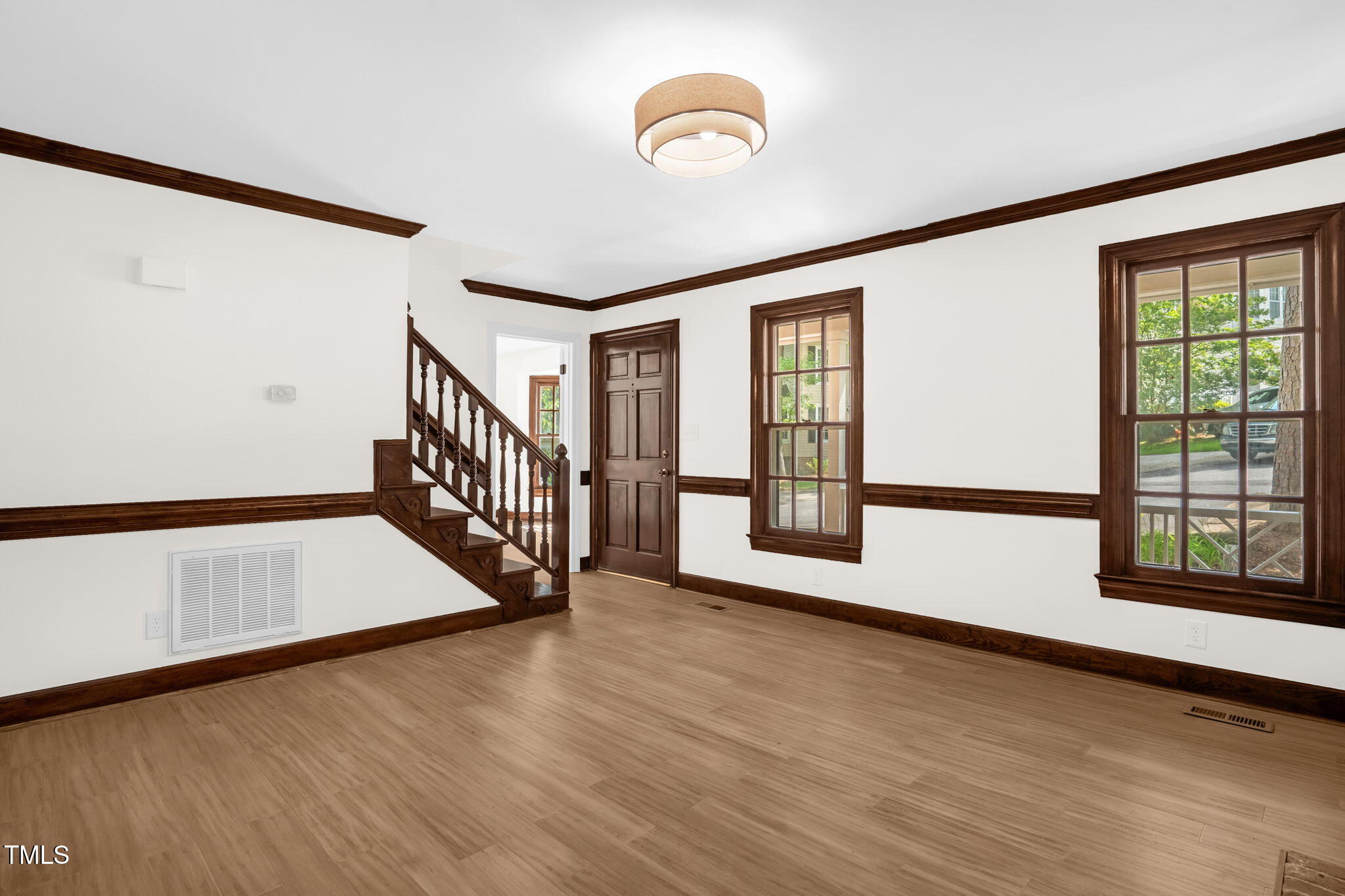 616 Cross Timbers Drive Durham, NC 27713 - Photo 9 of 29 a view of an entryway with wooden floor