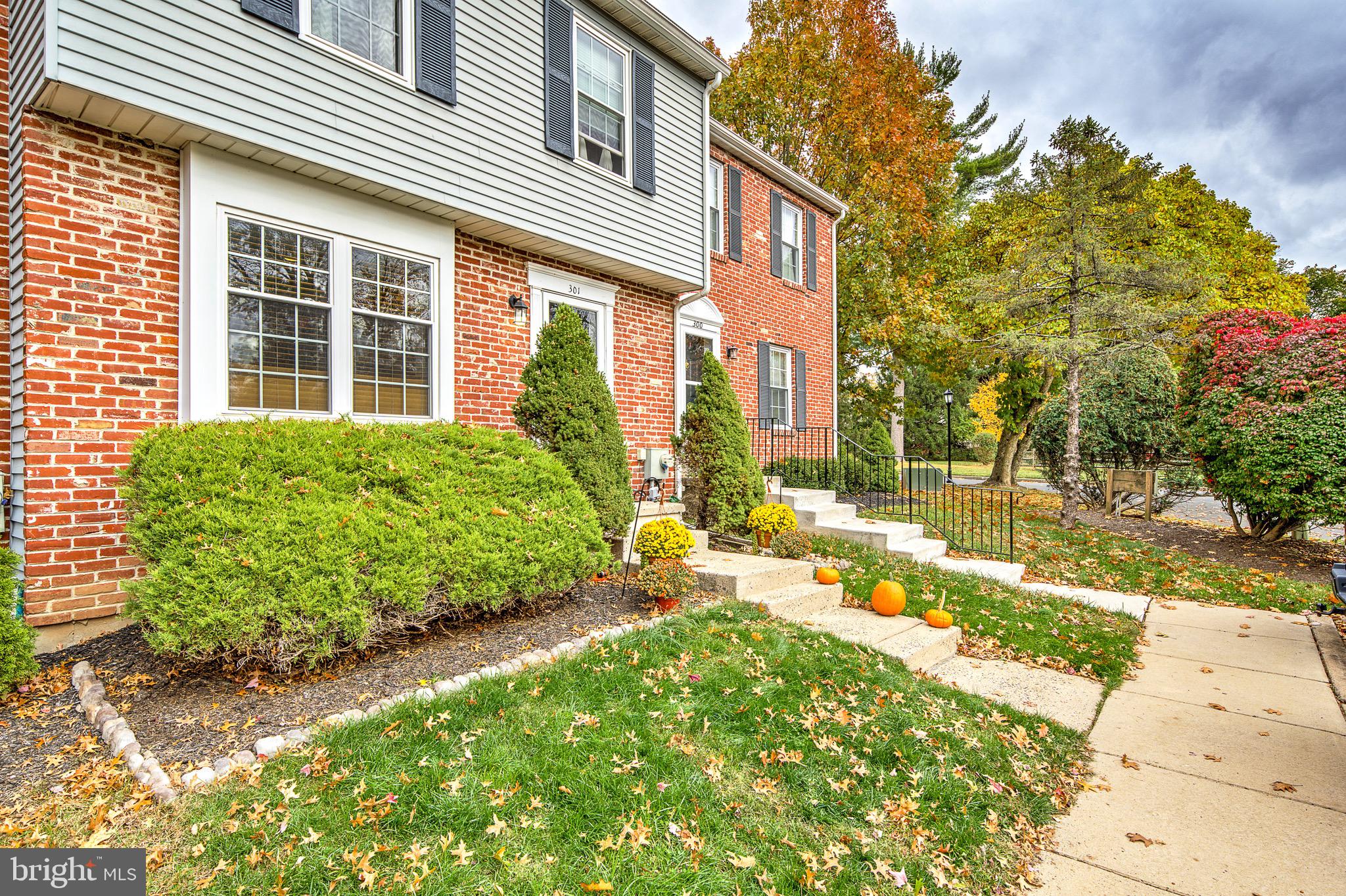 301 Cherokee Circle Ambler, PA 19002 - Photo 1 of 39 a view of a house with a yard and sitting area