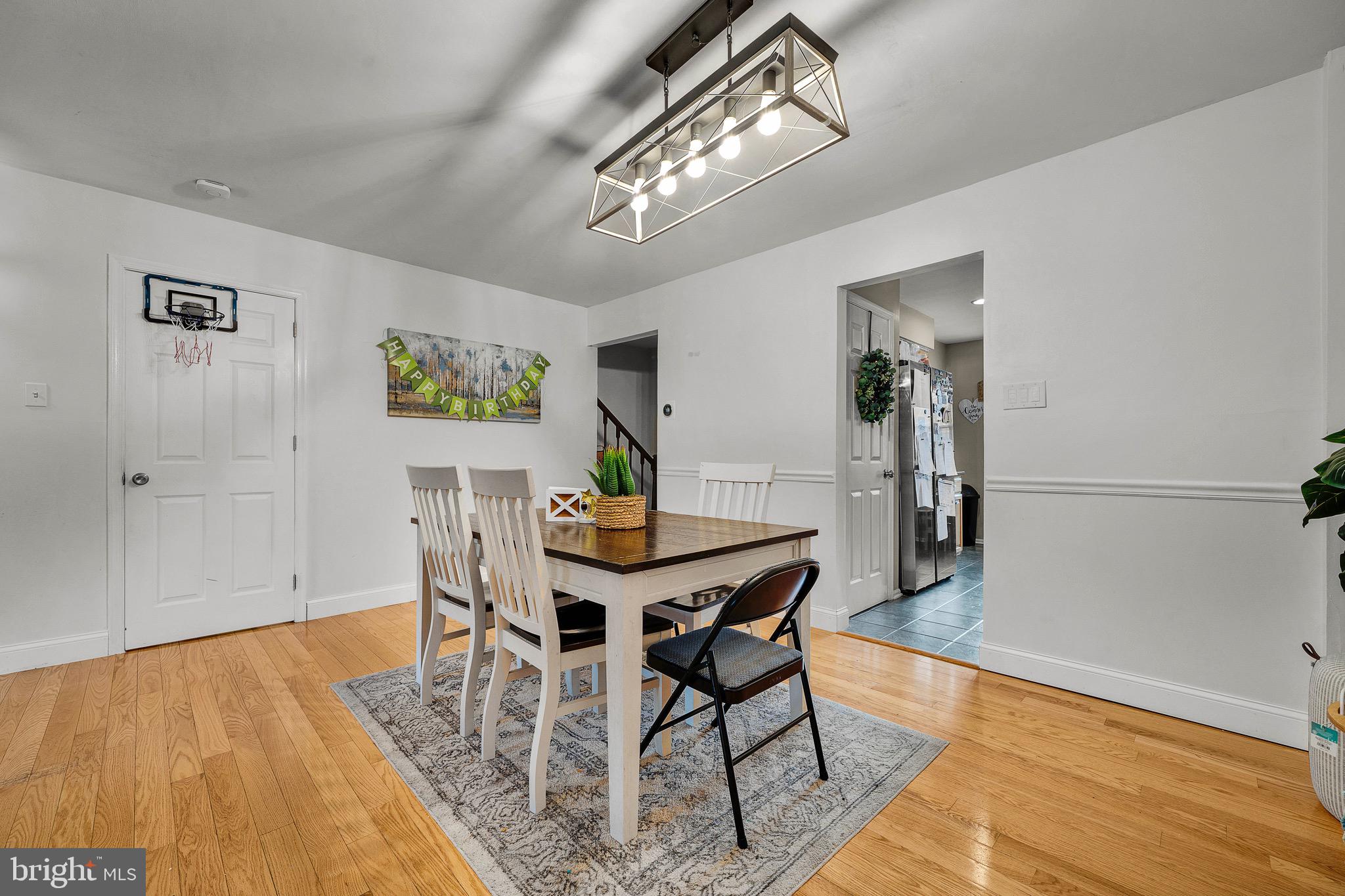 301 Cherokee Circle Ambler, PA 19002 - Photo 14 of 39 a view of a dining room with furniture and wooden floor