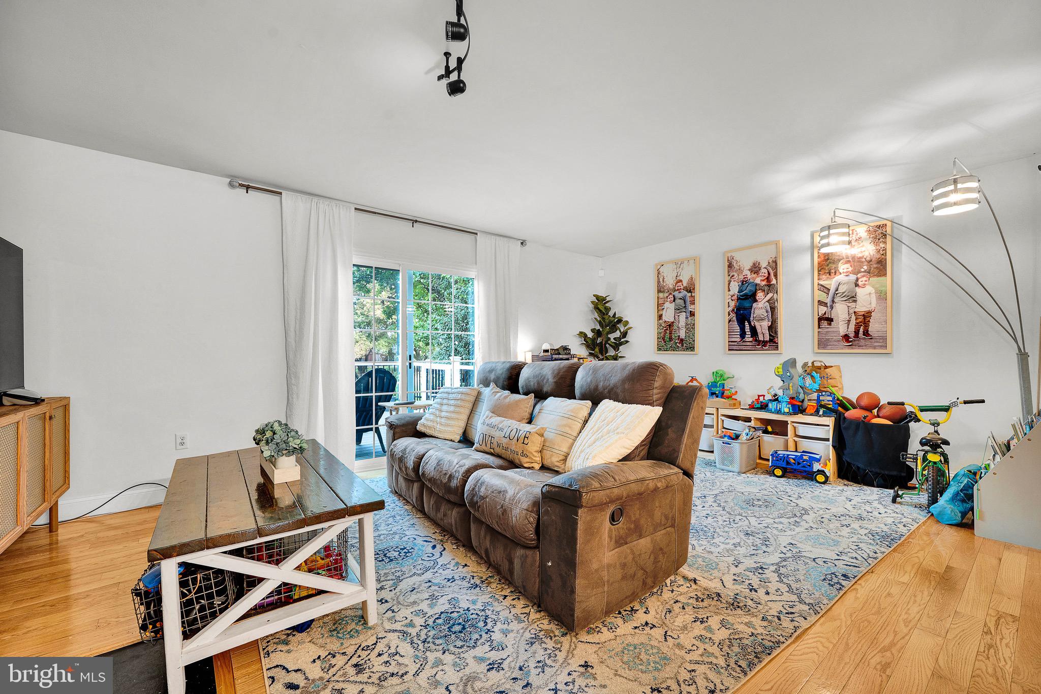 301 Cherokee Circle Ambler, PA 19002 - Photo 19 of 39 a living room with furniture and a window