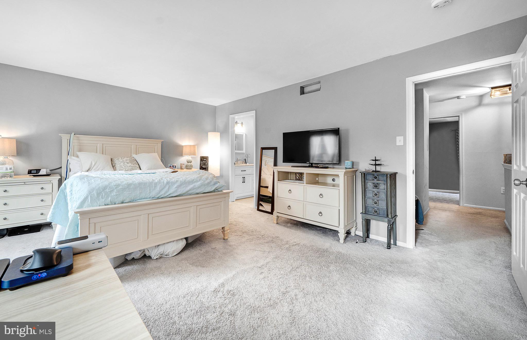 301 Cherokee Circle Ambler, PA 19002 - Photo 24 of 39 a bedroom with furniture and a flat screen tv