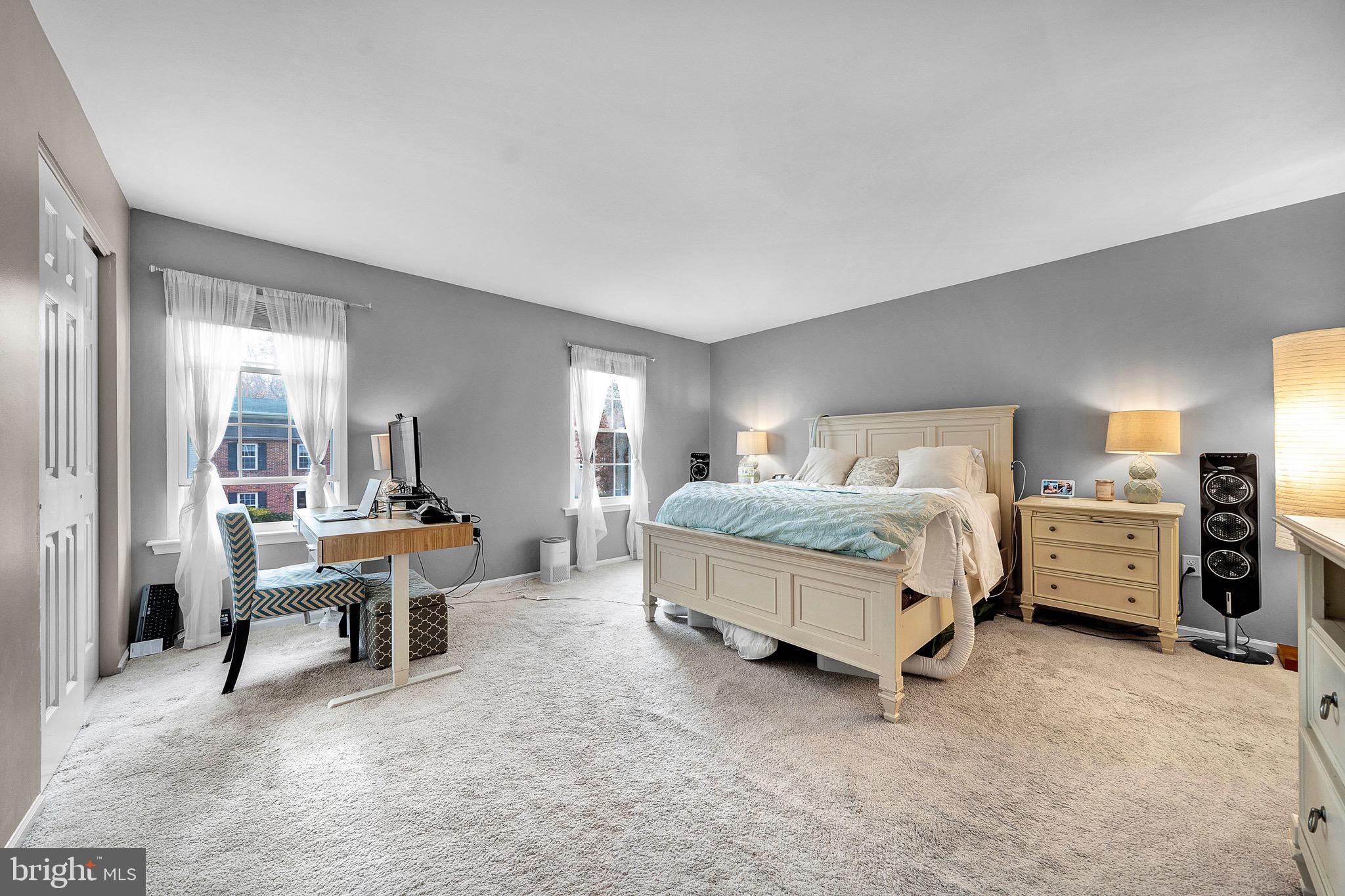 301 Cherokee Circle Ambler, PA 19002 - Photo 25 of 39 a bedroom with a bed and large window