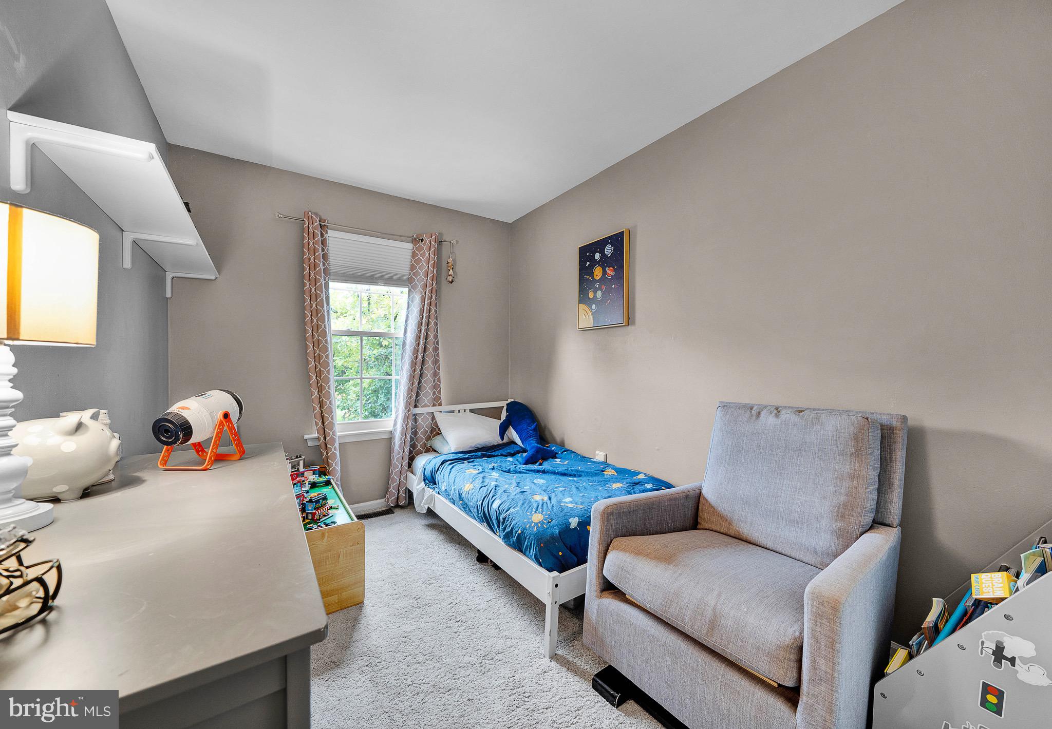 301 Cherokee Circle Ambler, PA 19002 - Photo 29 of 39 a living room with furniture and a window