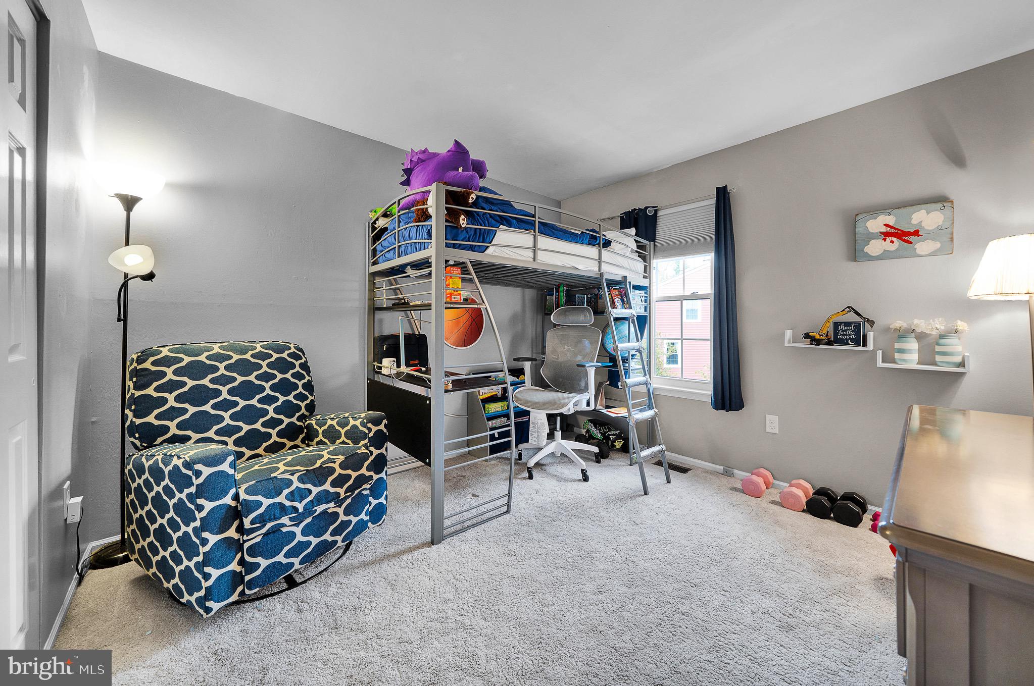 301 Cherokee Circle Ambler, PA 19002 - Photo 30 of 39 a bed room with a bed and a chair