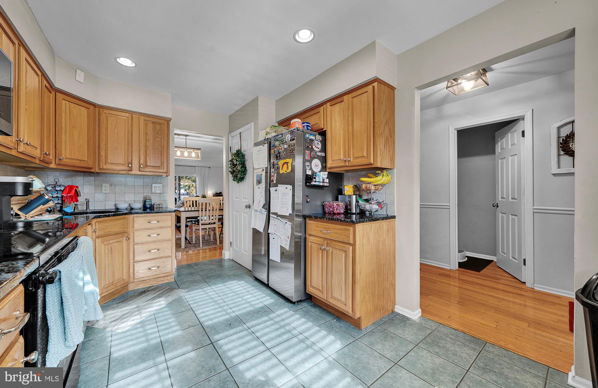 301 Cherokee Circle Ambler, PA 19002 - Photo 10 of 39 a kitchen with window and cabinets