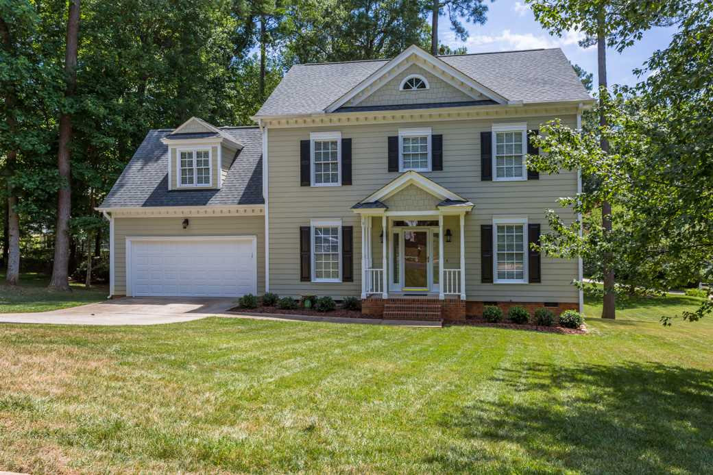 11817 Radner Way Raleigh, NC 27613 - Photo 14 of 15 HARRINGTON GROVE home with OPEN floor plan & tons of NATURAL LIGHT. Updates include GRANITE counters, STAINLESS STEEL appliances., new FIXTURES & more. HARDWOODS, smooth ceilings and plenty of storage space. Fresh paint inside & out. A MUST SEE! Exterior Front