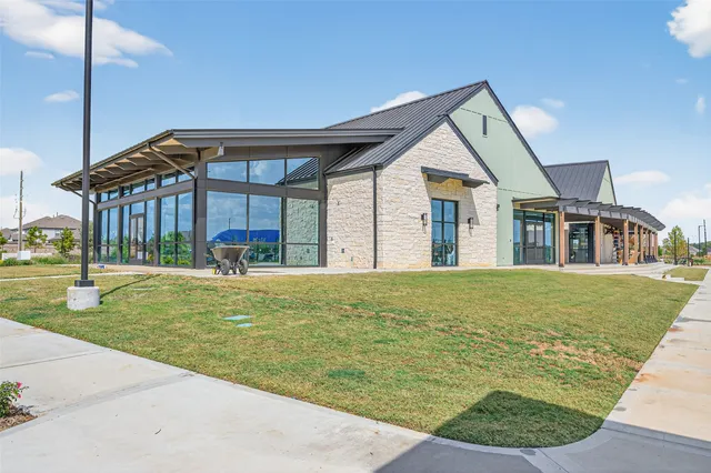 a view of a garden with flowers and plants