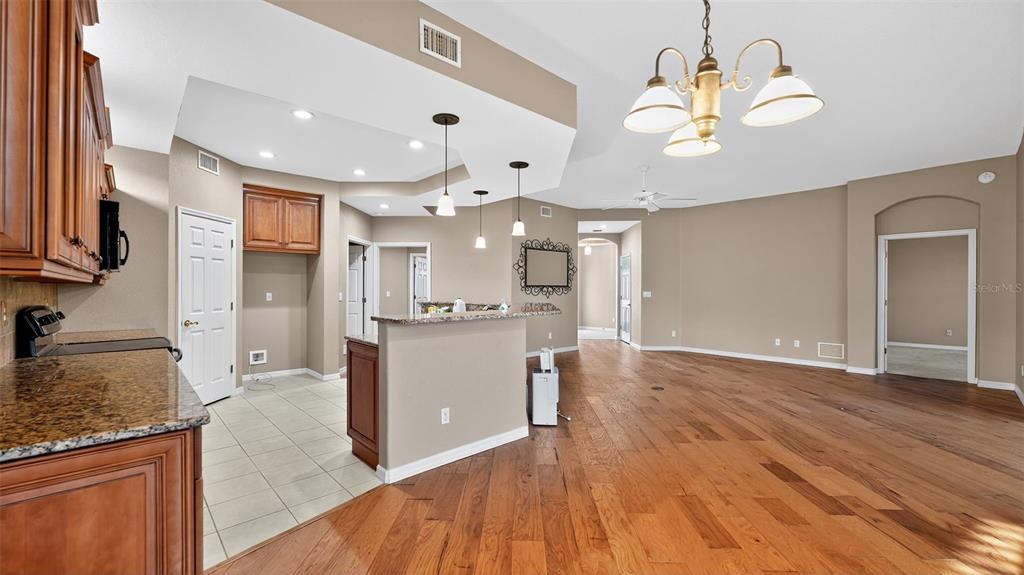 3959 San Rocco Drive, Unit 412 Punta Gorda, FL 33950 - Photo 15 of 41 a view of a kitchen and kitchen island
