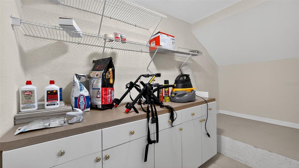 3959 San Rocco Drive, Unit 412 Punta Gorda, FL 33950 - Photo 21 of 41 a view of storage and utility room with two washing machine