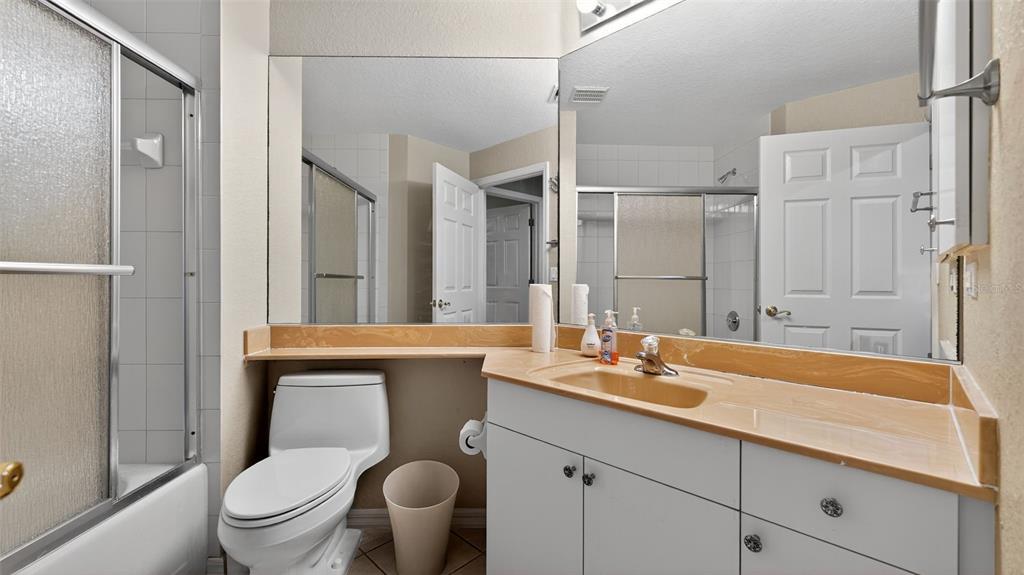 3959 San Rocco Drive, Unit 412 Punta Gorda, FL 33950 - Photo 26 of 41 a bathroom with a sink toilet and shower