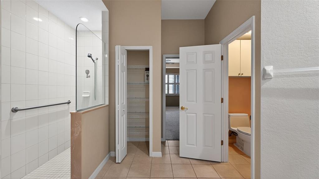 3959 San Rocco Drive, Unit 412 Punta Gorda, FL 33950 - Photo 31 of 41 a bathroom with a shower and a glass door