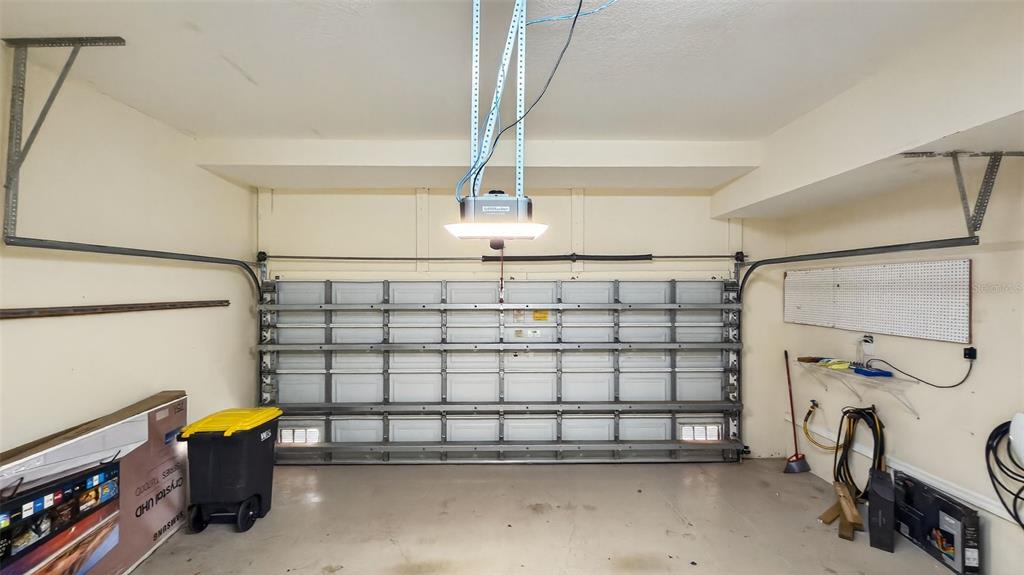 3959 San Rocco Drive, Unit 412 Punta Gorda, FL 33950 - Photo 32 of 41 a view of a garage with stuff