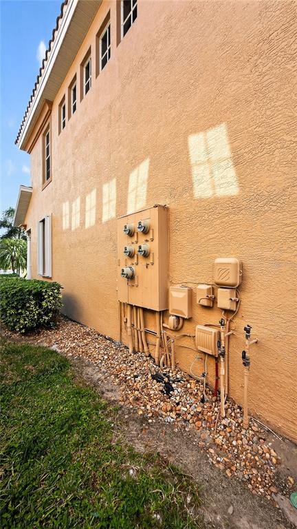 3959 San Rocco Drive, Unit 412 Punta Gorda, FL 33950 - Photo 39 of 41 a view of a chairs and table in the backyard