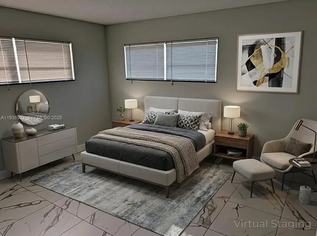 a bedroom with a bed and couch
