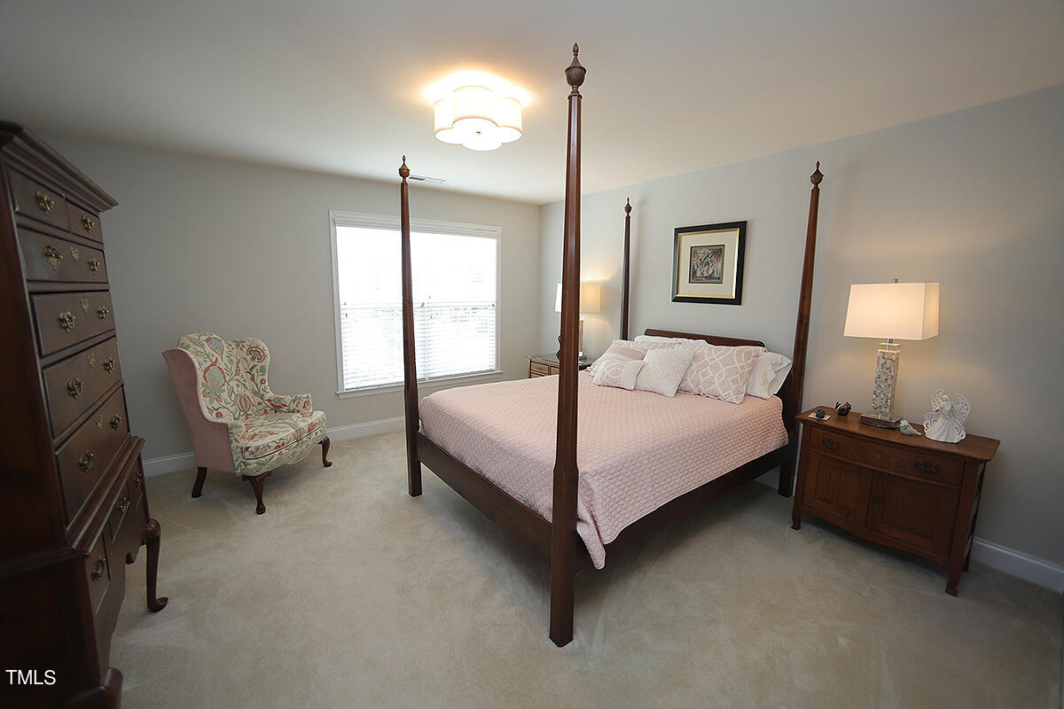 9511 Dellbrook Court Raleigh, NC 27617 - Photo 24 of 37 Bedroom 2