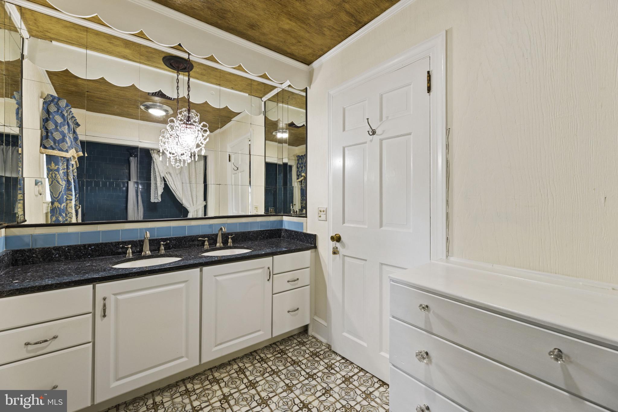 9265 Ramey Road Marshall, VA 20115 - Photo 13 of 49 a bathroom with a double vanity sink mirror and