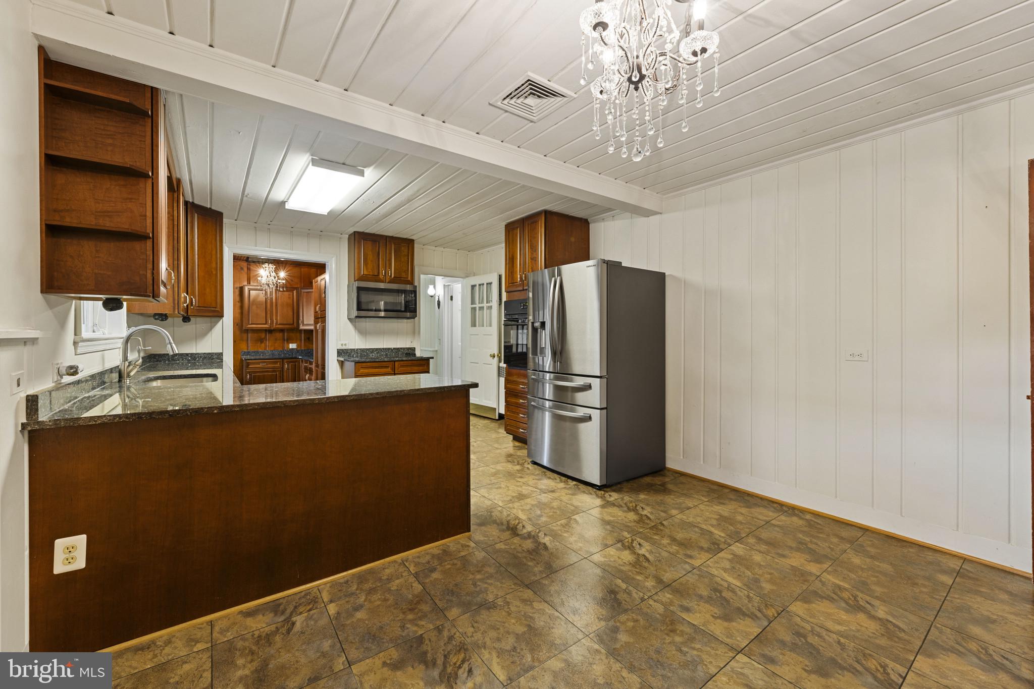 9265 Ramey Road Marshall, VA 20115 - Photo 25 of 49 a view of kitchen with refrigerator and ceiling fan