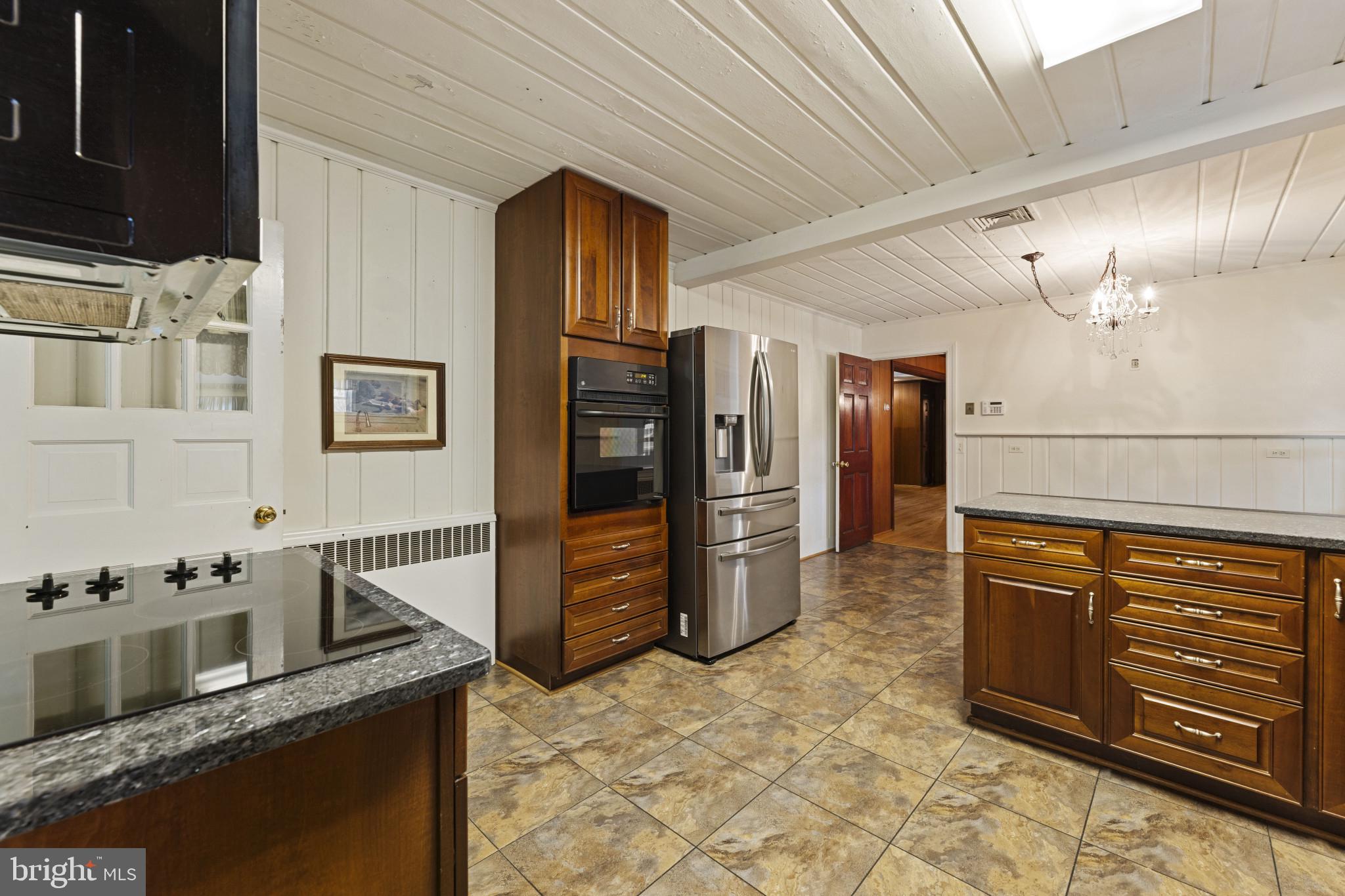 9265 Ramey Road Marshall, VA 20115 - Photo 27 of 49 a kitchen with stainless steel appliances granite countertop a refrigerator and a sink