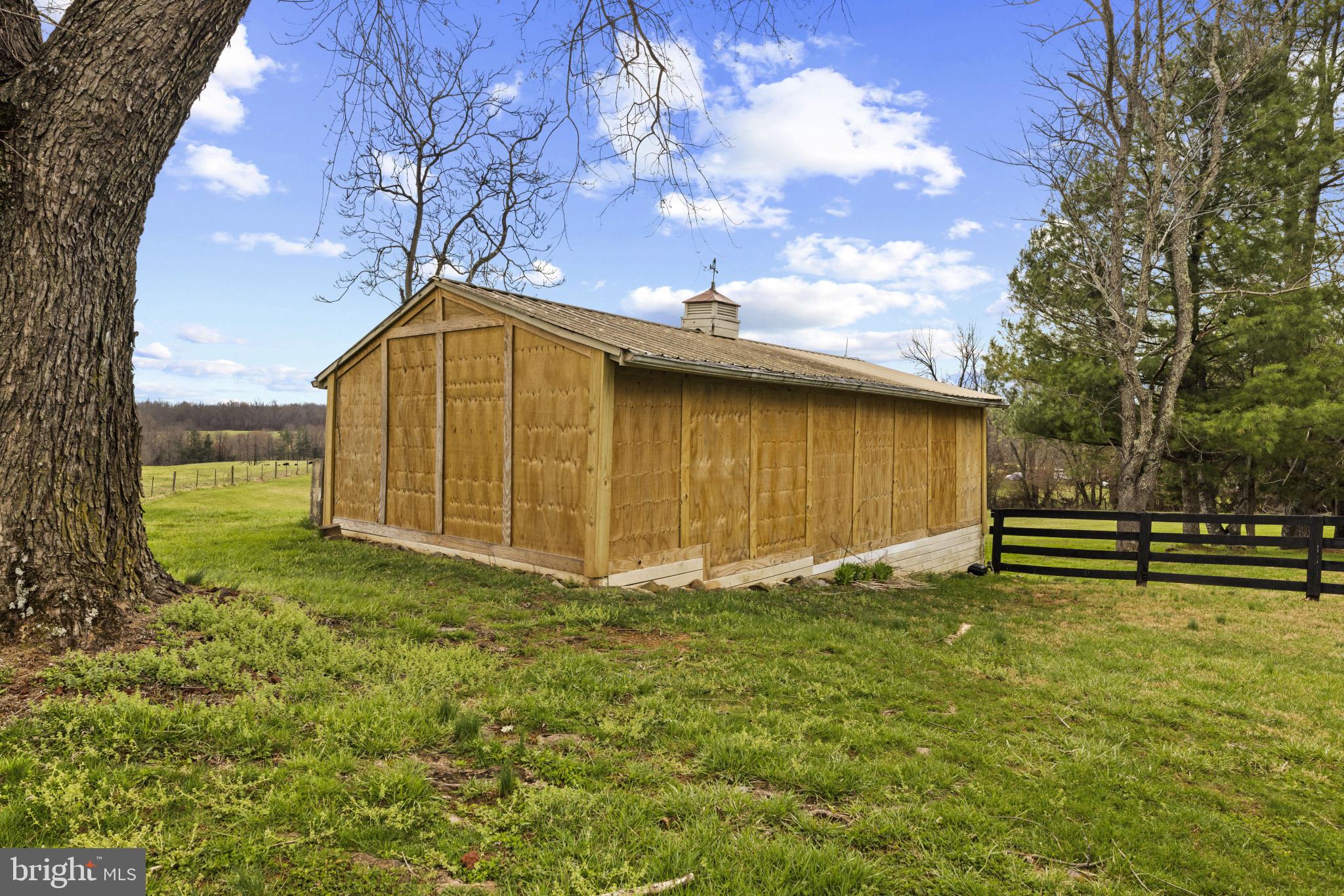 9265 Ramey Road Marshall, VA 20115 - Photo 41 of 49 a view of a backyard with a garden and entertaining space