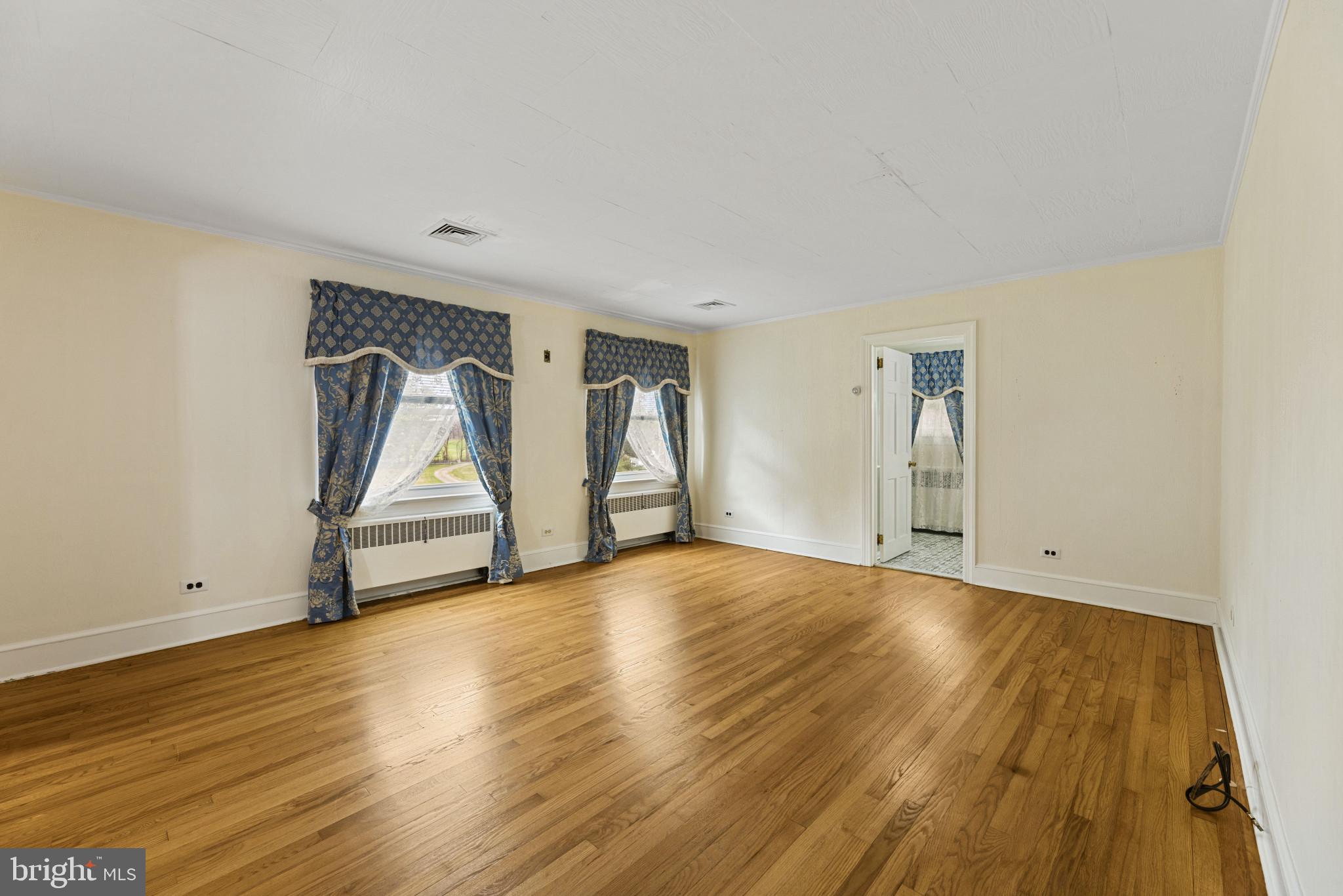 9265 Ramey Road Marshall, VA 20115 - Photo 10 of 49 a view of empty room with wooden floor and fan