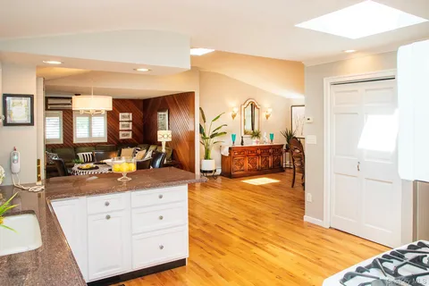 a view of a swimming pool with a yard