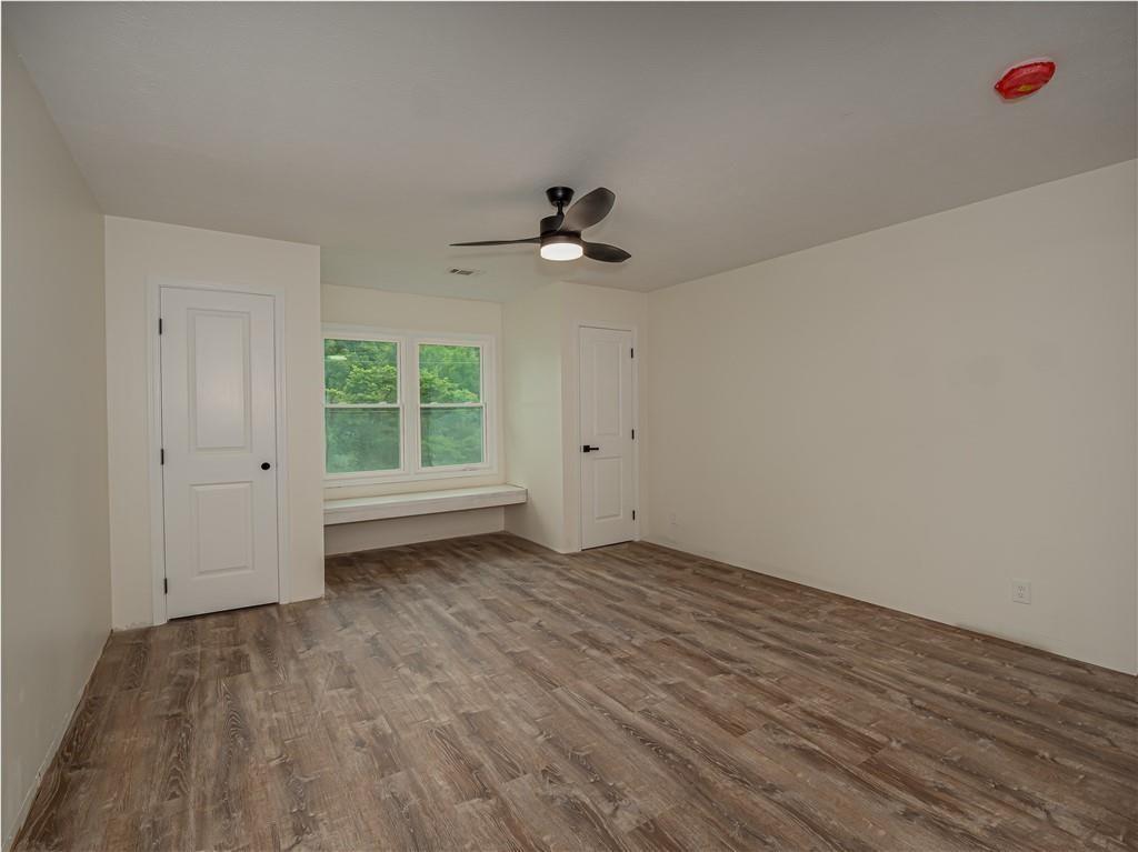 4505 Myrtle Hill Road Northeast Kennesaw, GA 30144 - Photo 22 of 27 wooden floor in an empty room with a window