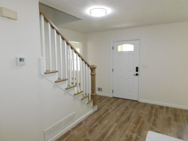 4505 Myrtle Hill Road Northeast Kennesaw, GA 30144 - Photo 3 of 27 a view of entryway with wooden floor