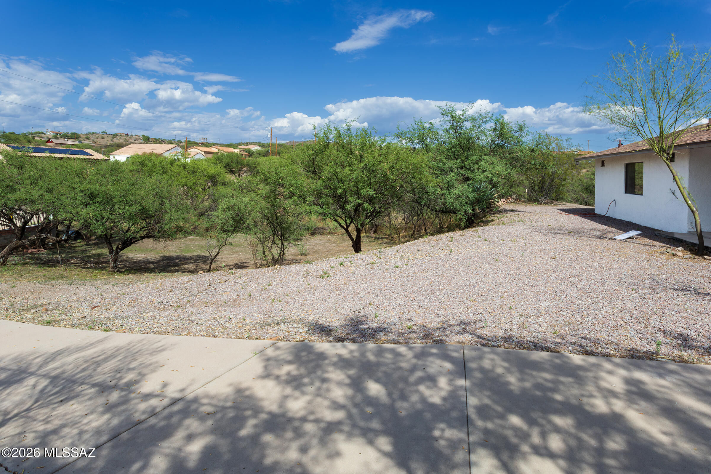 1081 Paseo Freno Rio Rico, AZ 85648 - Photo 43 of 46 a view of a yard with a house