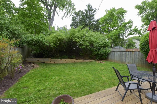 a garden view with a seating space