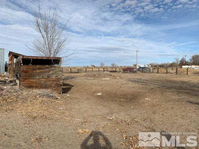 2975 Lone Tree Road Fallon, NV 89406 - Photo 26 of 26 a view of a yard with an outdoor space