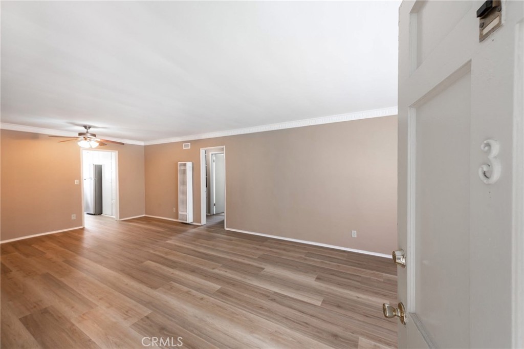 5319 Whitsett Avenue, Unit 3 Valley Village, CA 91607 - Photo 3 of 11 a view of an empty room with wooden floor