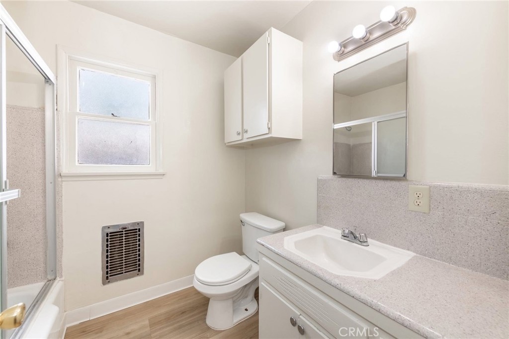 5319 Whitsett Avenue, Unit 3 Valley Village, CA 91607 - Photo 6 of 11 a bathroom with a sink toilet and mirror
