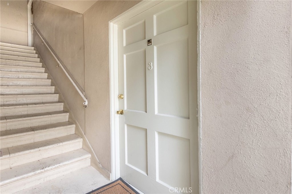 5319 Whitsett Avenue, Unit 3 Valley Village, CA 91607 - Photo 9 of 11 a view of staircase with white walls and white door