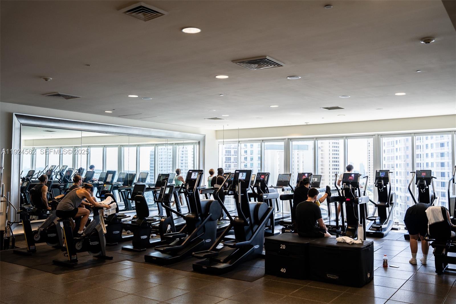 495 Brickell Avenue, Unit 501 Miami, FL 33131 - Photo 29 of 34 a view of a room with gym equipment