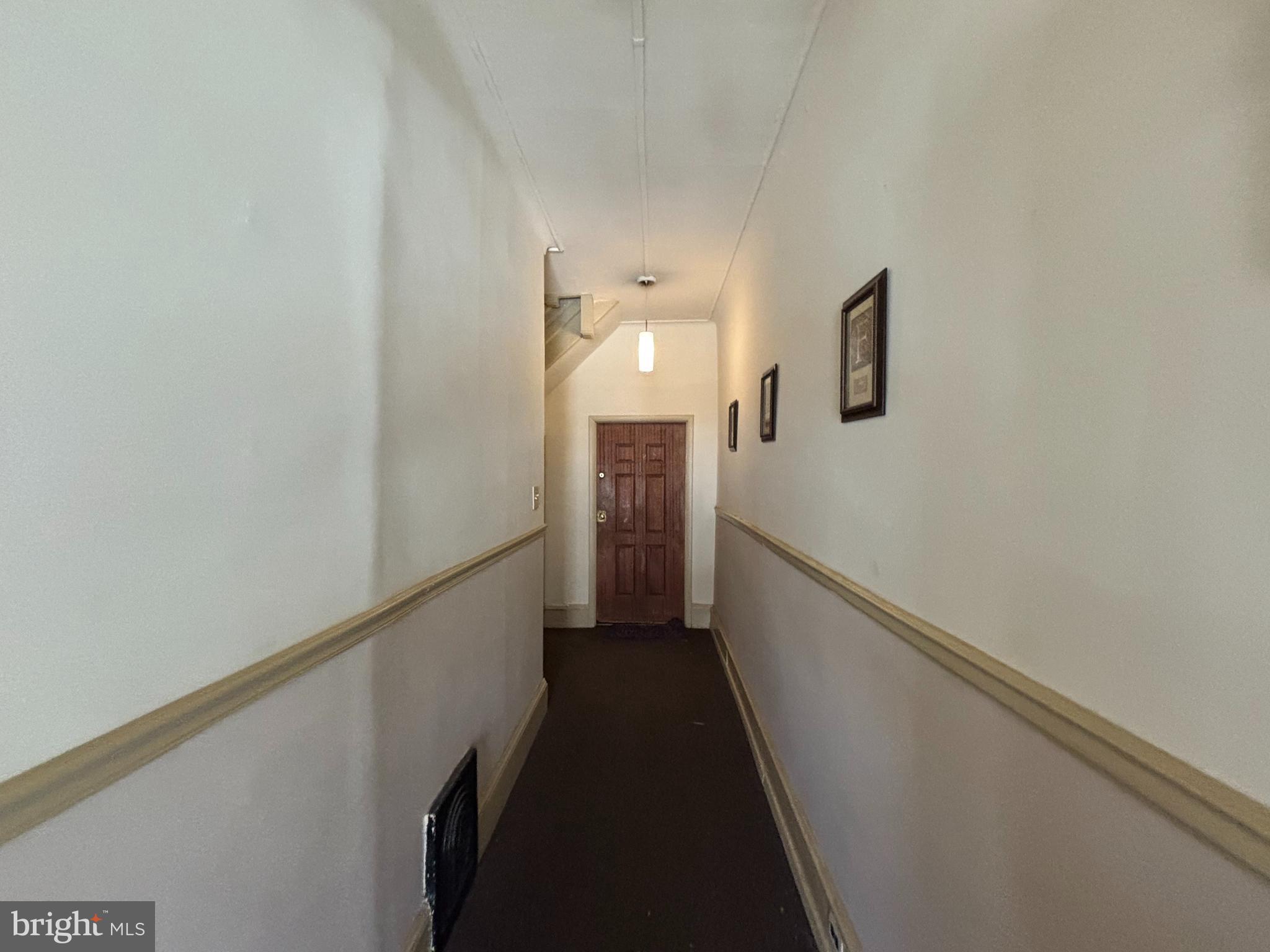 3734 North Sydenham Street, Unit 1 Philadelphia, PA 19140 - Photo 5 of 6 a view of a hallway with stairs