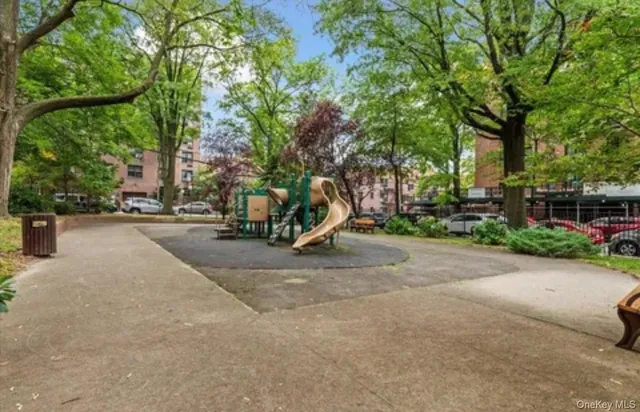 a view of a backyard with sitting area