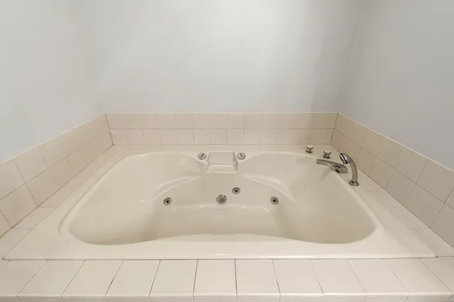 a view of a livingroom with furniture and staircase