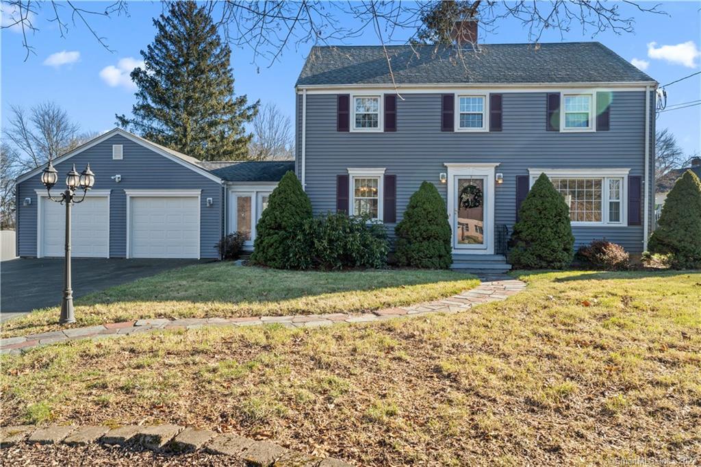 385 Hope Hill Road Wallingford, CT 06492 - Photo 1 of 1 a front view of a house with a yard