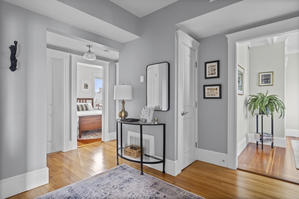 40 King Street, Unit 3 Boston, MA 02122 - Photo 5 of 14 a view of a livingroom with furniture and hardwood floor