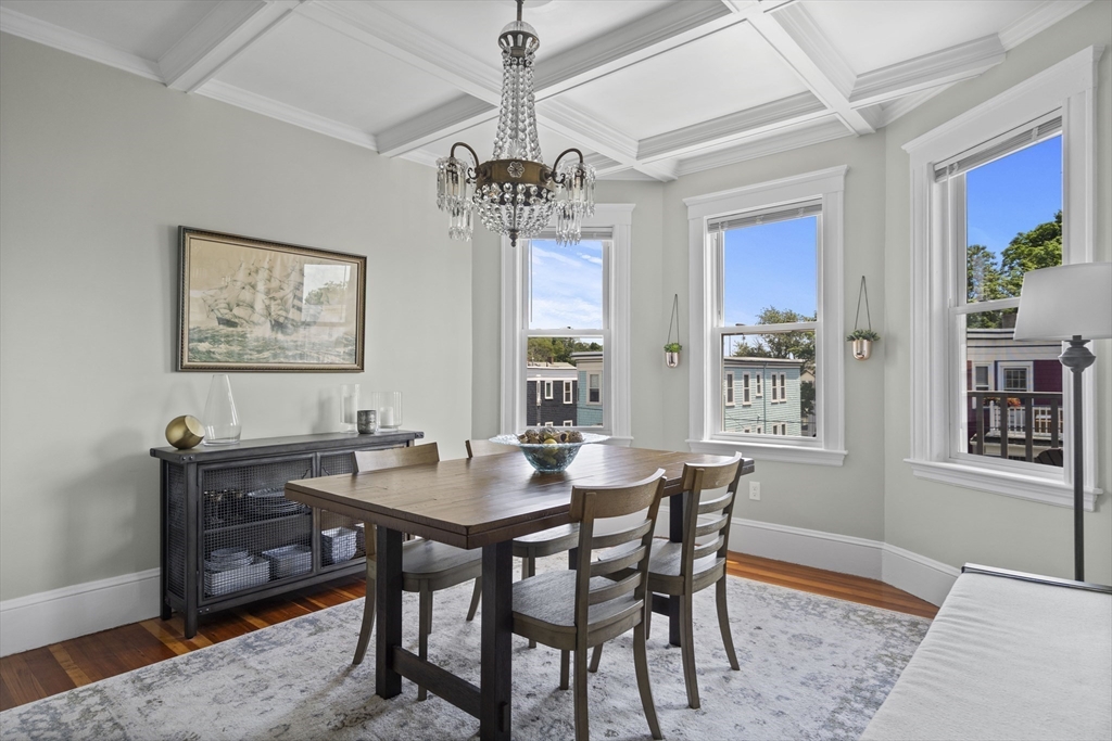 40 King Street, Unit 3 Boston, MA 02122 - Photo 8 of 14 a view of a dining room with furniture window and wooden floor