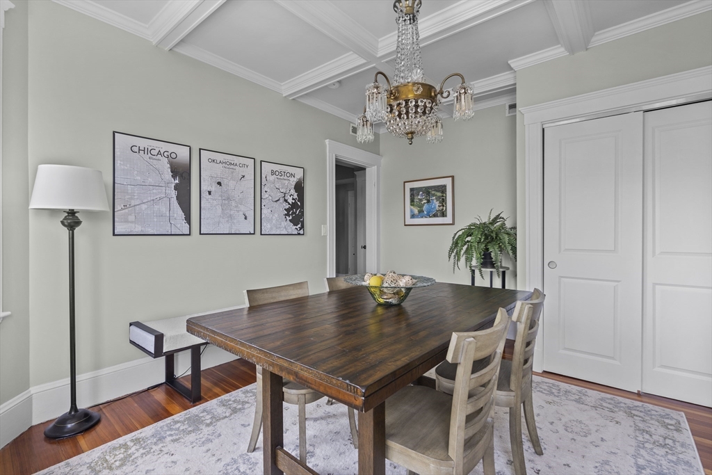 40 King Street, Unit 3 Boston, MA 02122 - Photo 10 of 14 a view of a dining room with furniture and chandelier