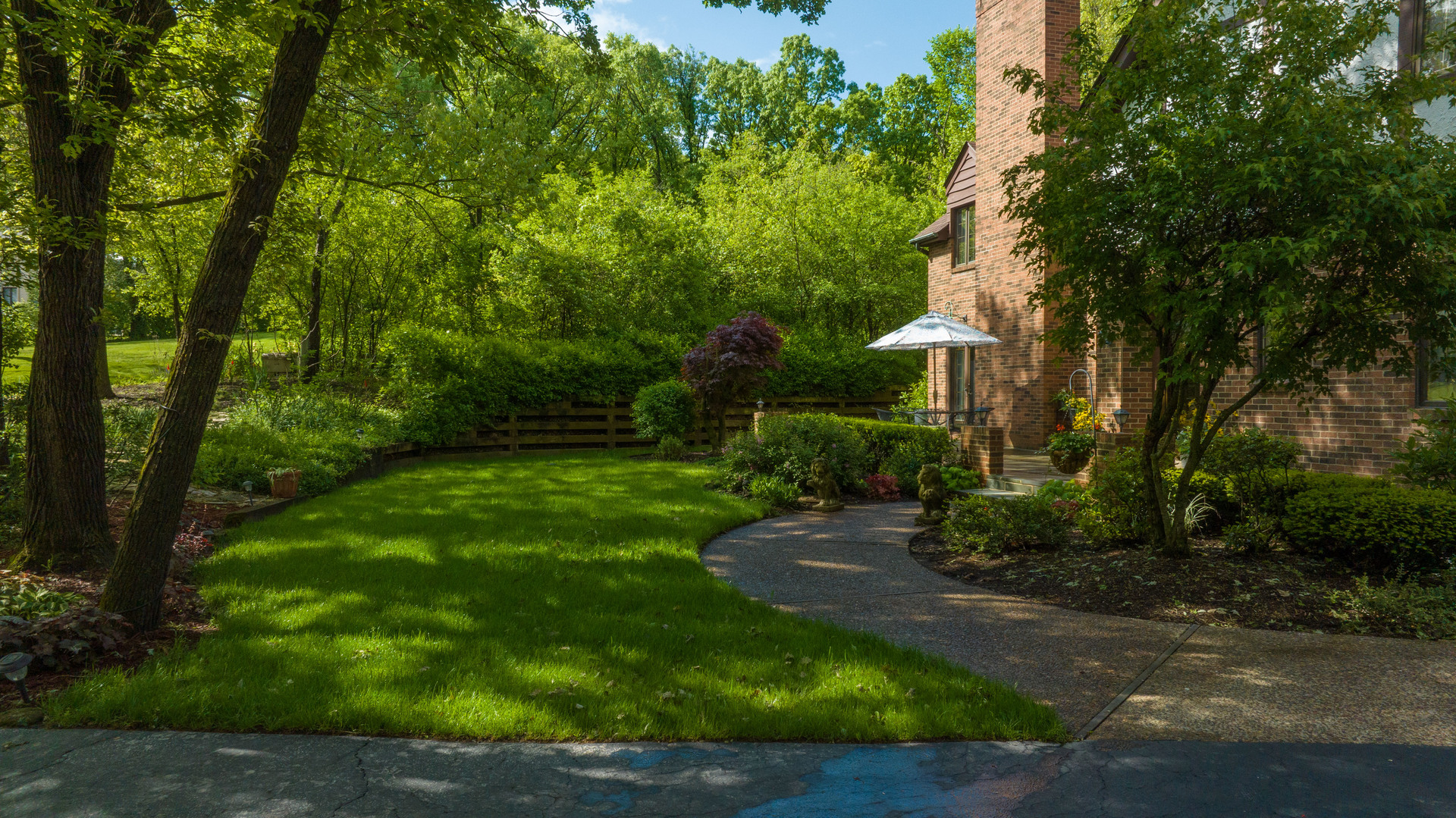 46 Ramsgate Drive Palos Park, IL 60464 - Photo 3 of 46 a view of a yard with plants and large trees
