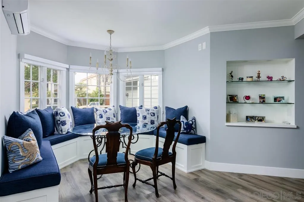 9 Buccaneer Way Coronado, CA 92118 - Photo 12 of 23 a living room with furniture and a chandelier