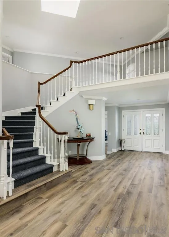 9 Buccaneer Way Coronado, CA 92118 - Photo 13 of 23 a view of staircase with white walls and a window