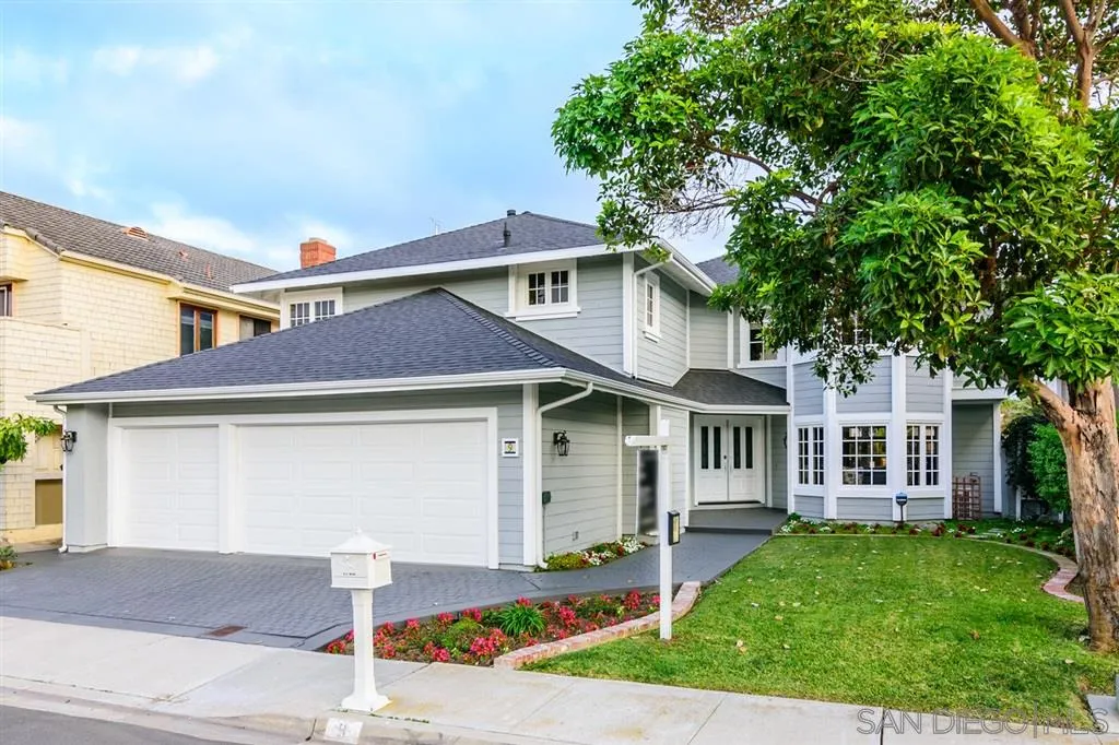 9 Buccaneer Way Coronado, CA 92118 - Photo 2 of 23 a front view of a house with a yard