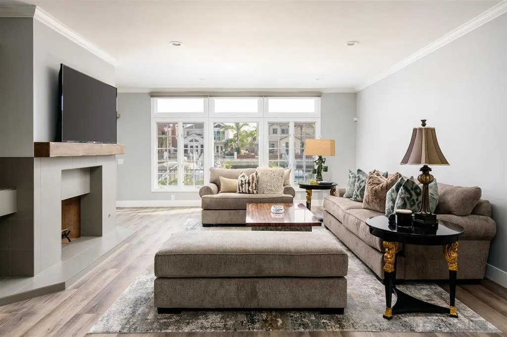 9 Buccaneer Way Coronado, CA 92118 - Photo 8 of 23 a living room with furniture fireplace and flat screen tv