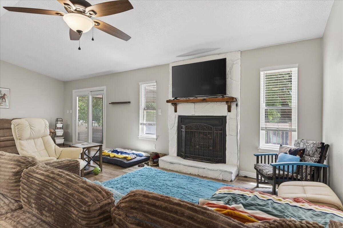 210 Shell Drive Crestview, FL 32536 - Photo 18 of 67 a living room with furniture fireplace and flat screen tv