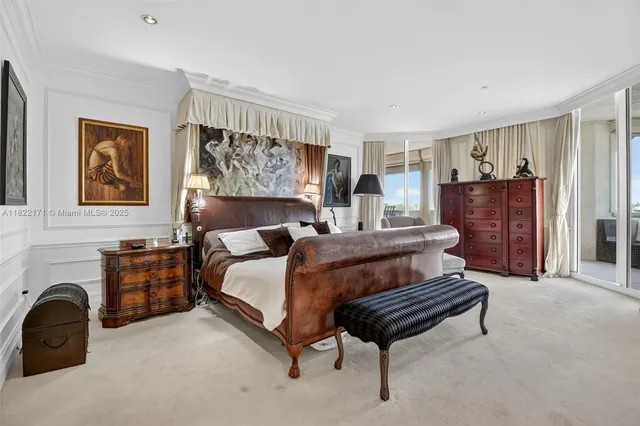 a spacious bathroom with a double vanity sink a mirror a bathtub and a toilet