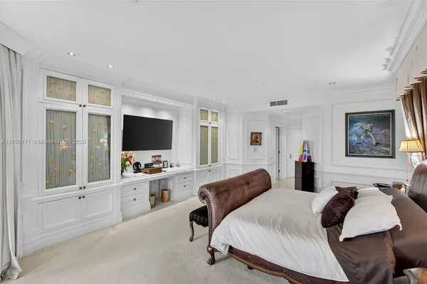 a kitchen with stainless steel appliances a stove a sink and a refrigerator