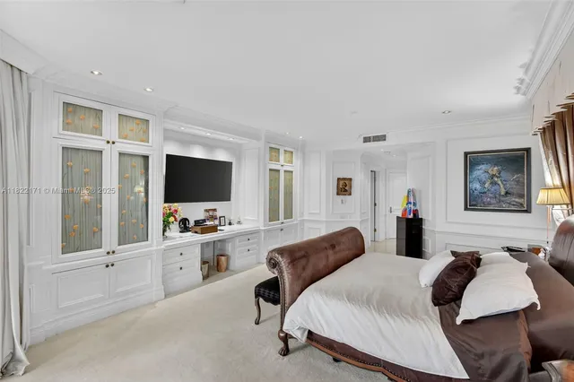 a kitchen with stainless steel appliances a stove a sink and a refrigerator